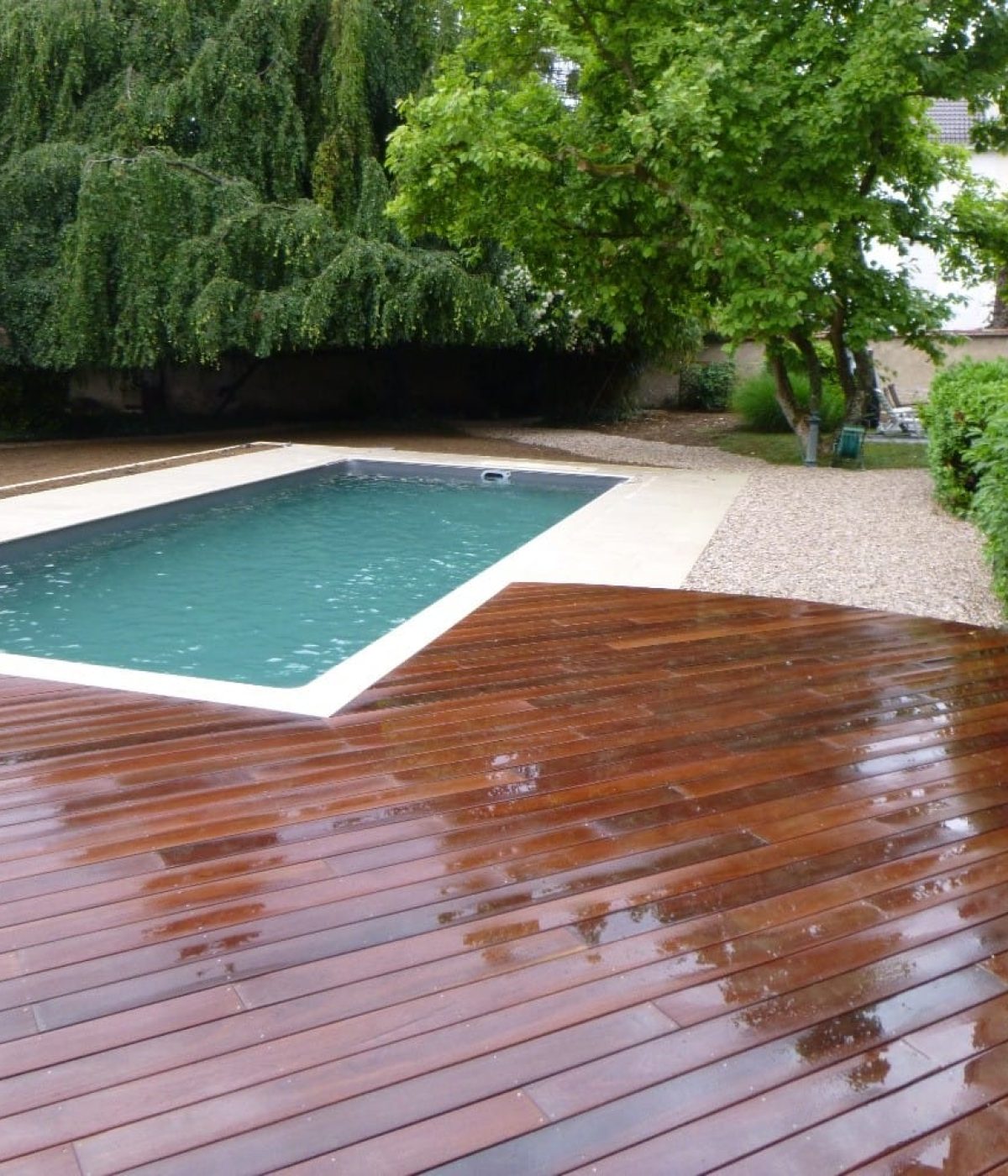 Piscine extérieure avec terrasse en bois - Qualité Spa & Piscine